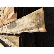 3.6m x 125/200mm (average) x 18mm Waney Edge treated softwood board
